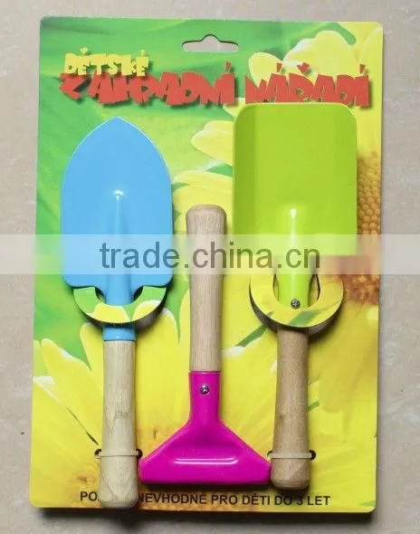 iron sapde with wooden handle garden tool wooden rake wooden shovel wooden spade