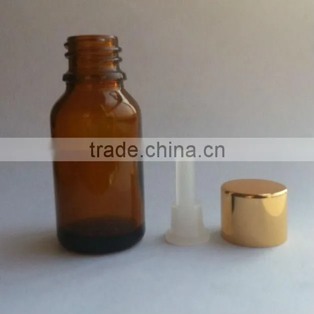 glass essential oil bottle with plastic cap and rubber dropper