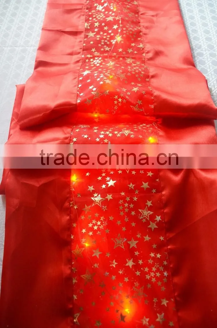 Fancy red wedding table runner with LED lights
