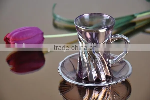 Copper plated glass cup and saucer