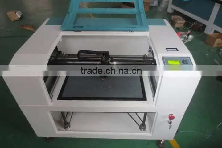 6090 laser engraver speedy 100 price co2 laser engraving cutting machine 40w with up and down platform