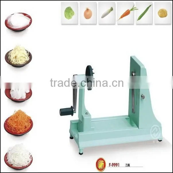 Green plastic cutting tool for cutting food and fruit