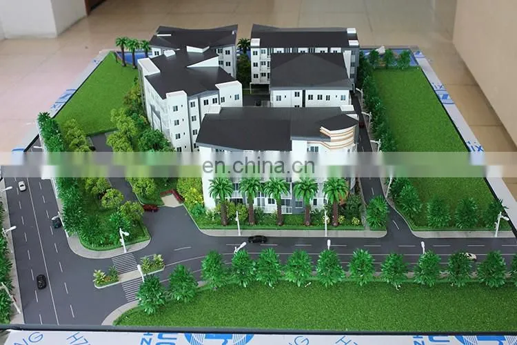 3d physical model architecture with model trees , cars and furniture