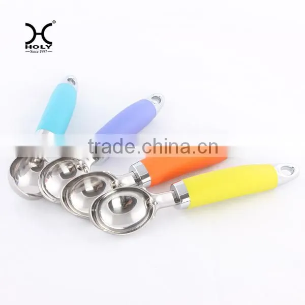 Ice cream spoon with 0range handle