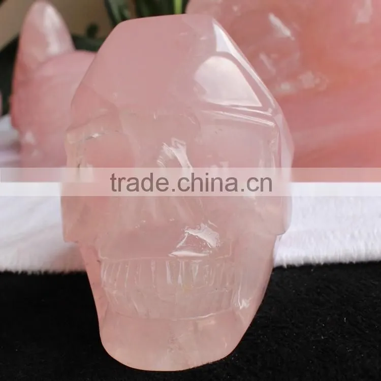 hand made rose quartz natural carved stone skull for healing wands