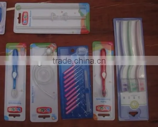 Automatic blister paper card filling and sealing machine for battery/toothbrush/etc