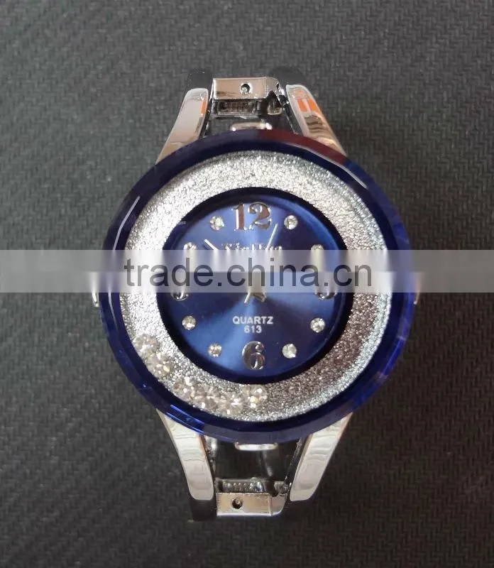 Floating bead deep blue cuff watch