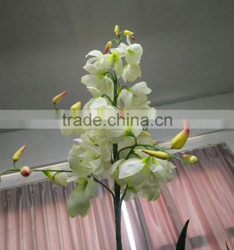 artificial green plant with flower for decoration