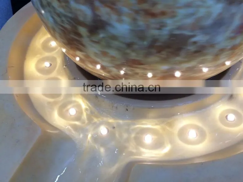LED yellow light color resin and sandstone fountain with ball