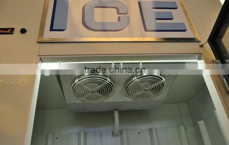 Upright ice merchandiser with fan cooling system