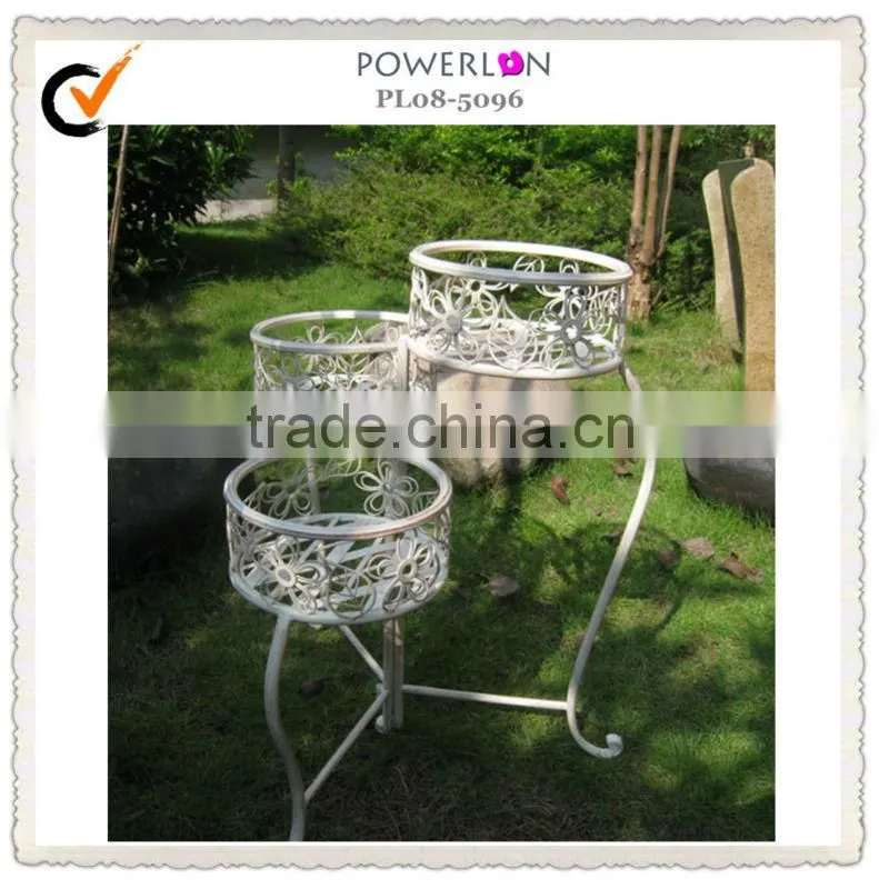 Antique metal plant pot trellis