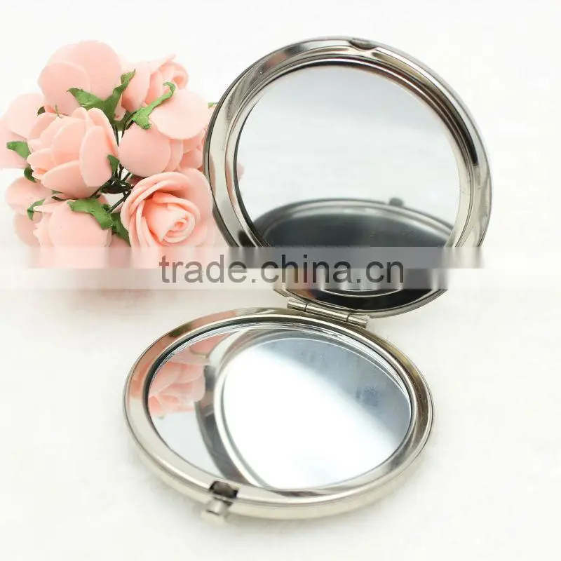 Religious metal round pocket mirror