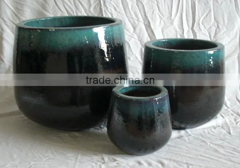 baby egg shape pottery pot In green color