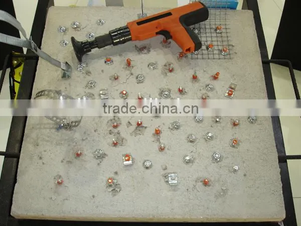 Shooting Nails With White Plastic Washer