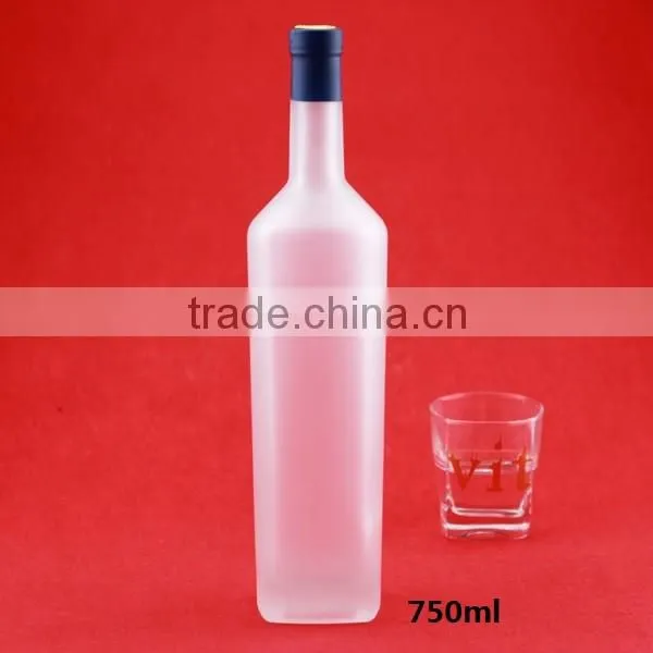 Bulk wholesale cheap cylindrical glass bottles frosted round bottles liquor bottles transparent