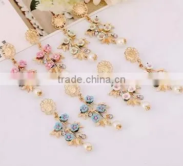 Latest design hot sale beautiful flower with pearl pendant earring