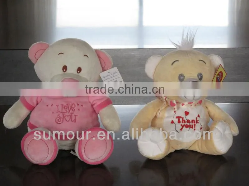 Hatted Stuffed Bear with a big pink heart & plush toys