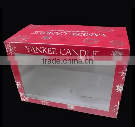 Red coloured packing box with clear window