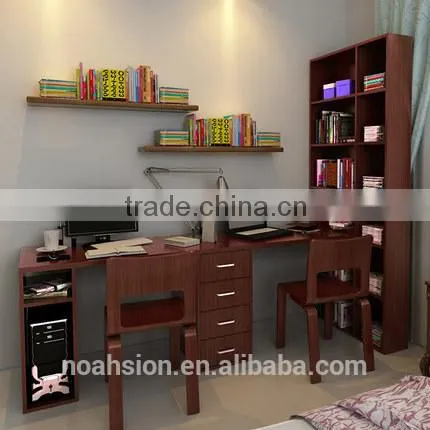 couple desktop laptop work desk with bookshelf