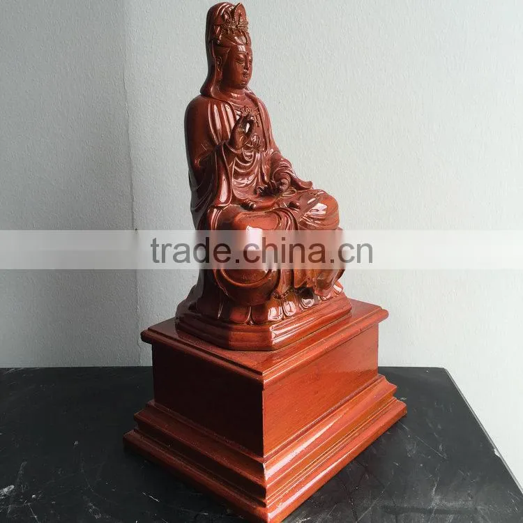 Small polyresin joss sculpture