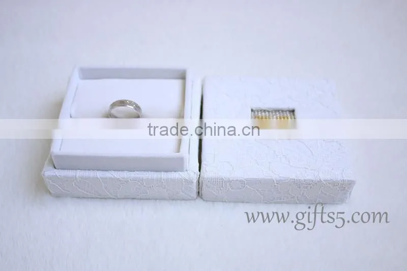 White wedding boxes for ring package with beaded name plate of M