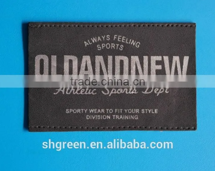 Green laser cut hot press embossed logo leather patch