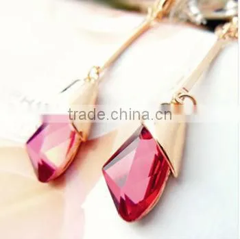 Ruby earrings, noble earrings. Simulation of diamond earrings