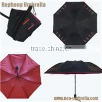 Red fold umbrella with white flower handle color match the fabric
