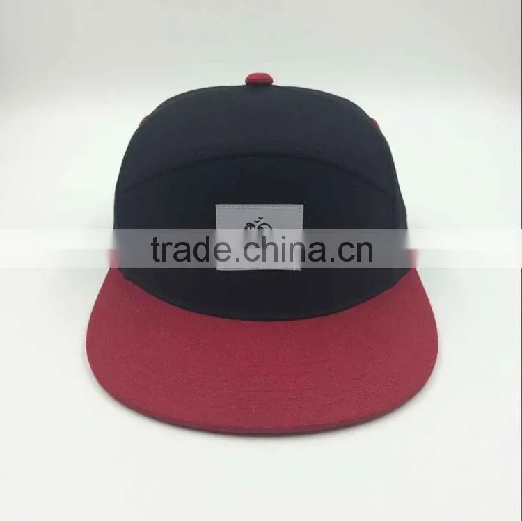 wholesale custom design your own logo 7 panel black snapback hat with woven label