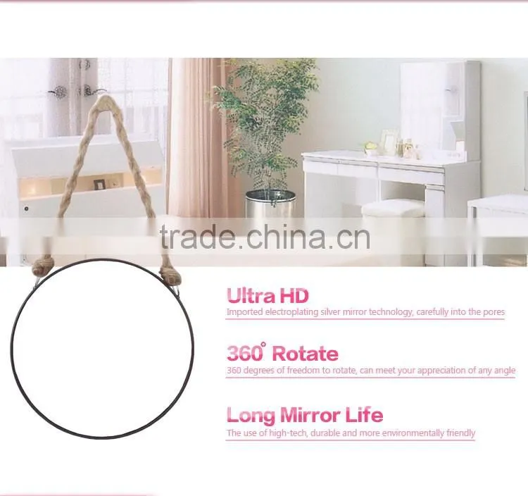 Round metal framed hanging makeup mirror