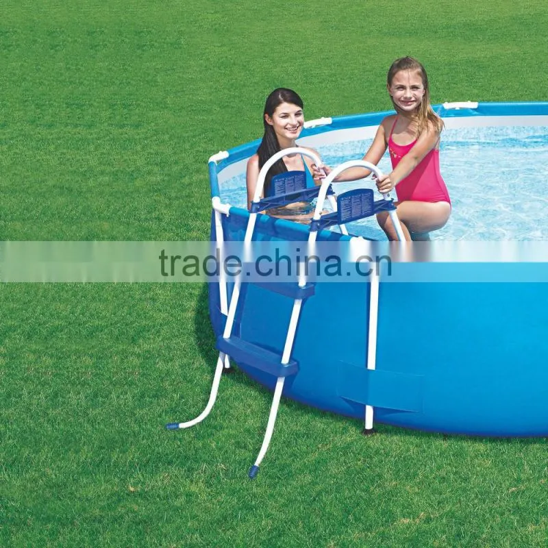 round swimming pool with ladders and frame