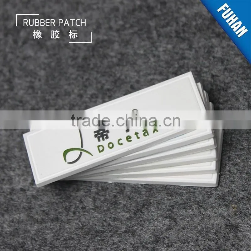 Embossed Custom White Background PVC Rubber Patch Logo