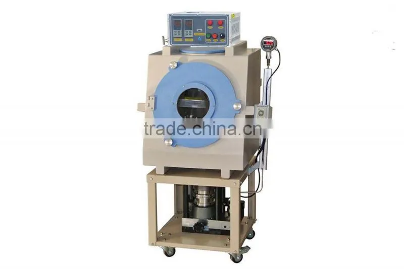 Vacuum heated pressing furnace for making dense compound materials