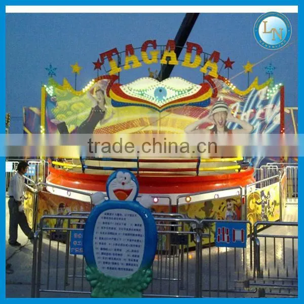 Theme park playground disco tagada dance ride