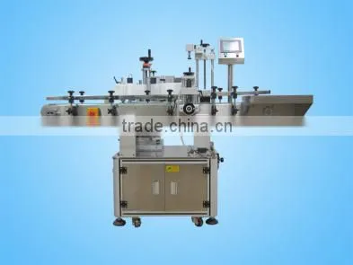 Positional round bottle labeling machine