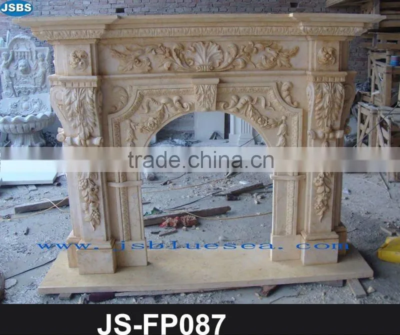 Yellow marble fireplace with lion statue