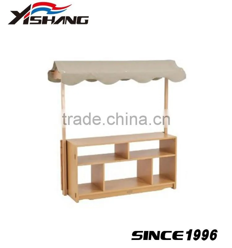 Antique wooden stand for kids clothes display rack