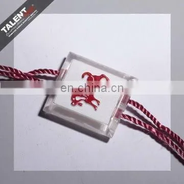 custom private brand name logo plastic seal tag for garment hang tag