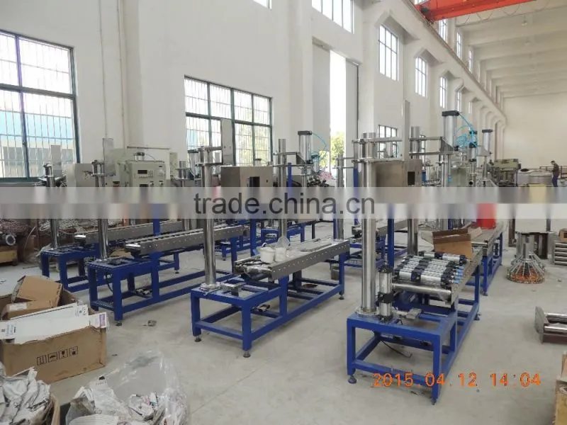 Drum/barrel weighing liquid filling and capping