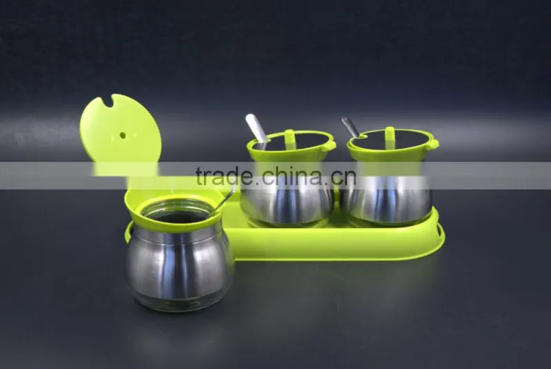 glass spice jar set on plastic base