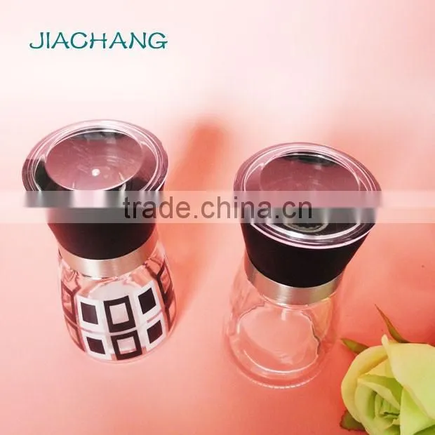 glass salt spice condiment jar with black grinder cap