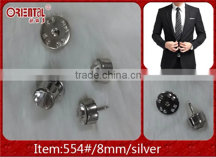 single clear diamond silver metal base brooch