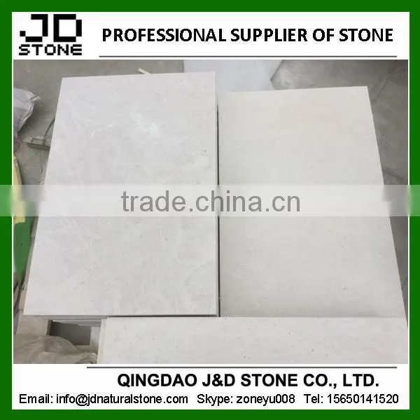 bush-hammered white sandstone paver