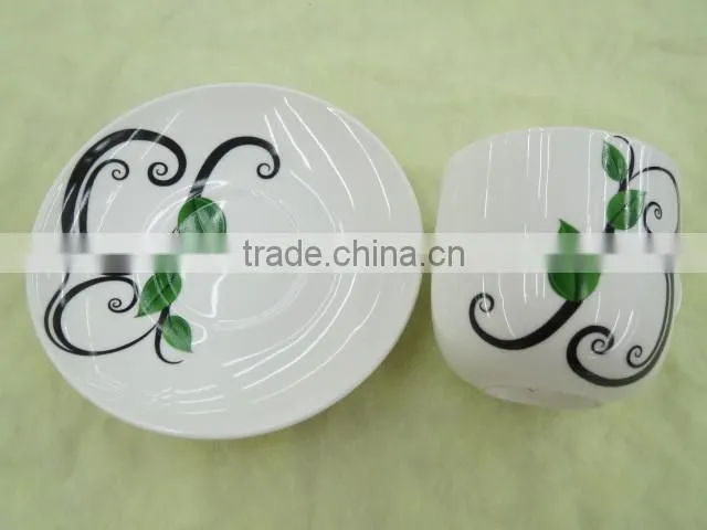 PORCELAIN TEA CUP AND SAUCER