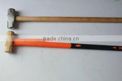 Sledge hammer with wooden handle