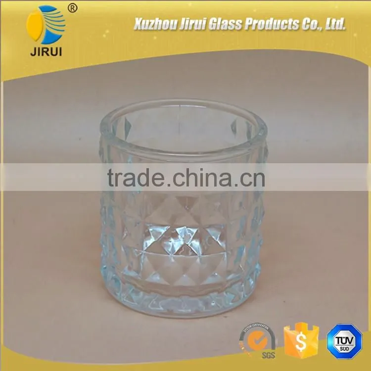 cylinder glass candle holder with engraved design