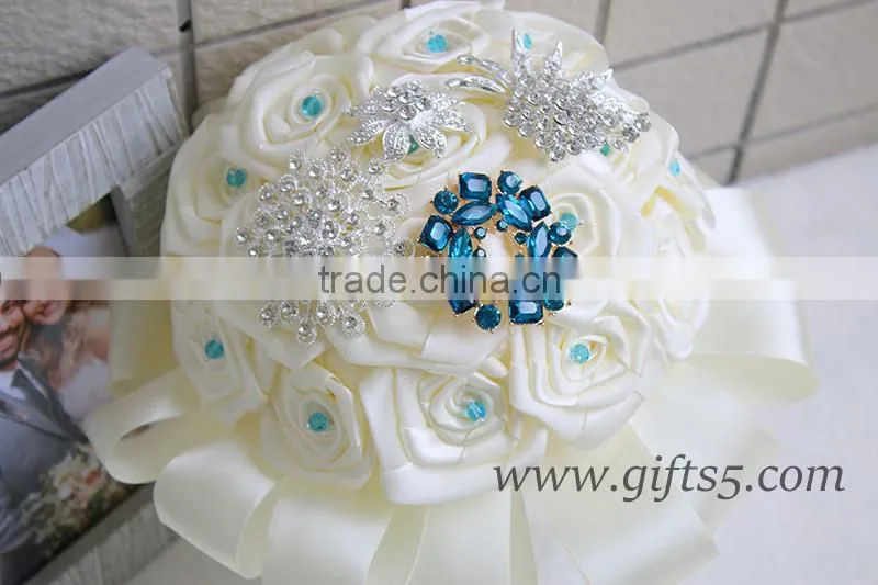 Customized Handmade wedding bouquets with gorgeous blue/ silver brooch