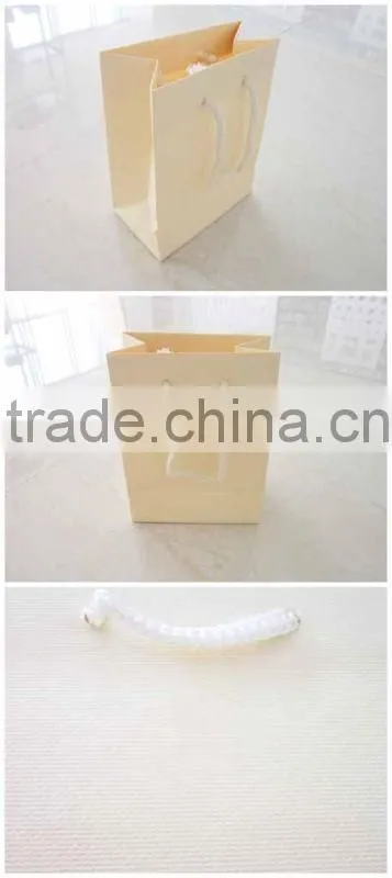 Fancy peige paper bags with cotton rope handle