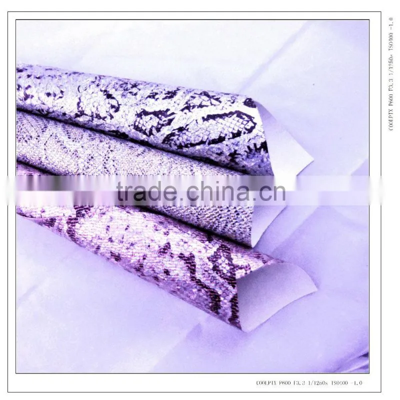 2015 hot sell fashion snake pattern glitter fabric pu leather