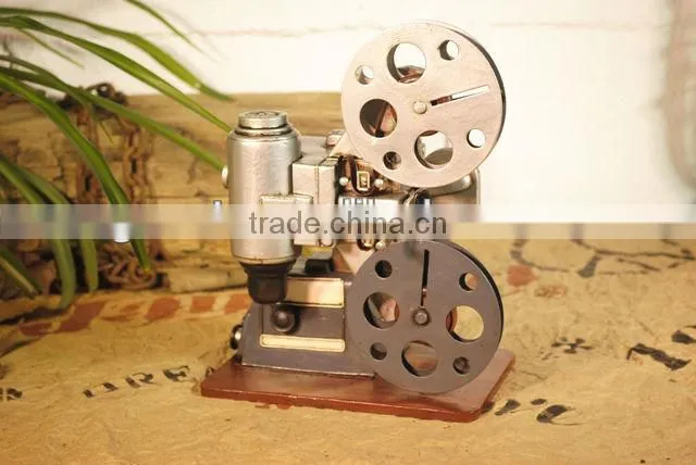 Antique metal movie camera model with paint